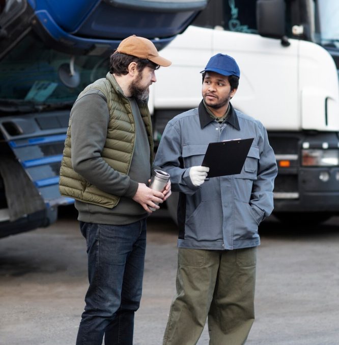 full-shot-men-discussing-document_23-2149426540-min (1)